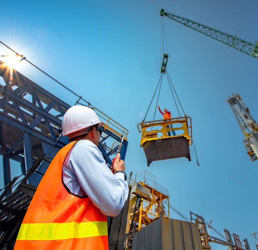 crane-lifting-employee-on-dock-med-two-col-billboard