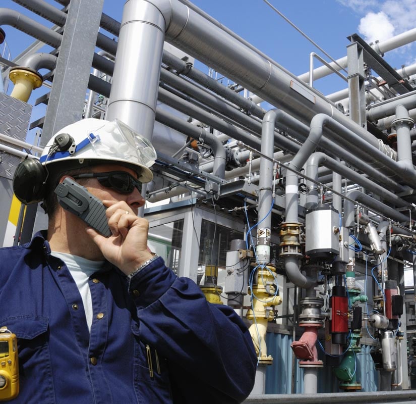 oil-refinery-employee-talking-on-walky-talky-med-two-col-billboard