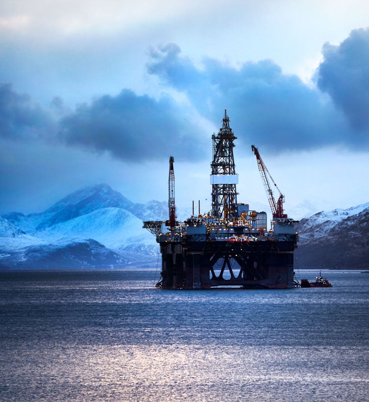oil-rig-near-snowy-shore-two-col